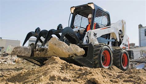 skid steer operation|excavating with a skid steer.